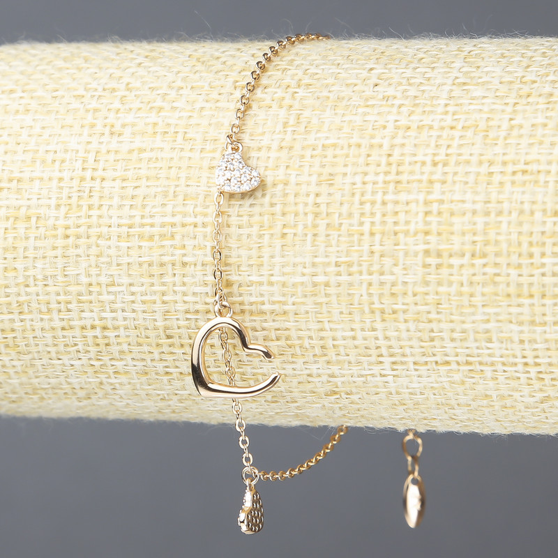 Náramek Xuping pozlacení 18K s bílými štrasovými kamínky, tloušťka 1,5 mm, délka 18–20 cm