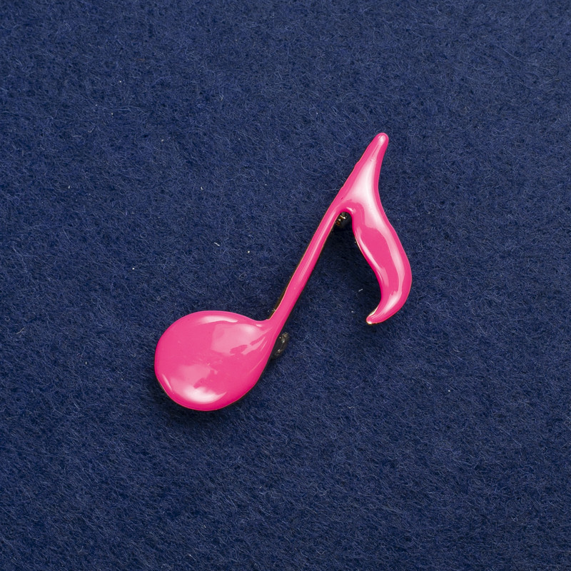 Brož Nota ze zlatistého kovu a smaltu 25×45 mm +