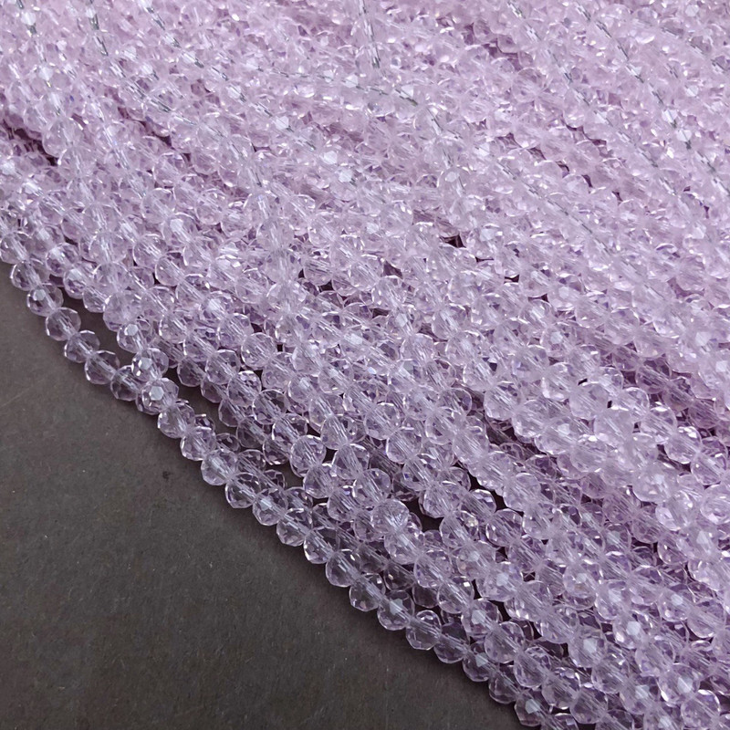 Korálky českého křišťálu na niti, jemně růžové, průhledné, broušené rondely, průměr 3,5×3 mm, délka 36–38 cm