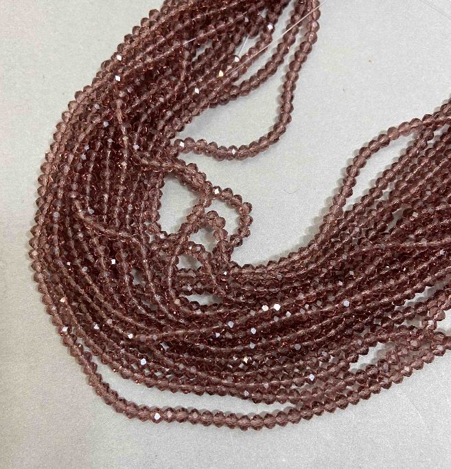 Korálky z Českého křišťálu na niti, světle hnědé průhledné, brusovaný rondel, průměr 3,5×3 mm, délka 33 cm