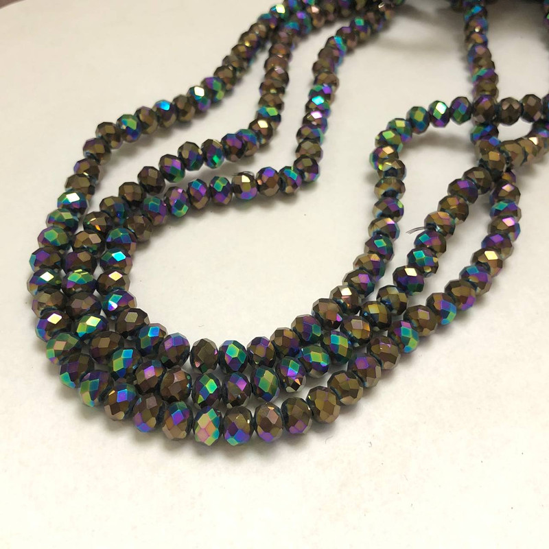 Rondelové korálky z českého křišťálu na vlascové niti, s benzínovým nástřikem, broušené, průměr 6 × 4,5 mm, délka 38–40 cm