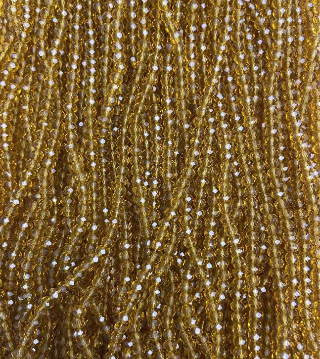 Korálky Český křišťál na šňůrce, jantarově průhledné, brusovaný rondel, průměr 3,5×3 mm, délka 33 cm