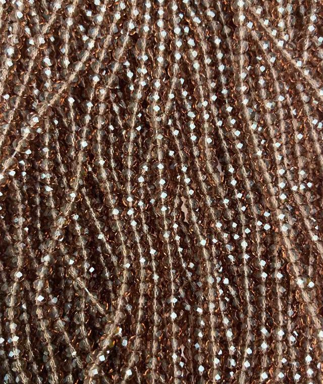 Korálky českého křišťálu na vlásence, hnědoprůhledé facetované rondely, průměr cca 3,5×3 mm, délka 32 cm