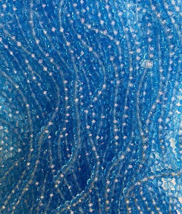 Korálky z českého křišťálu na vlásence, sytě modré průhledné, broušené rondely, průměr 6×4,5 mm, délka cca 38 cm