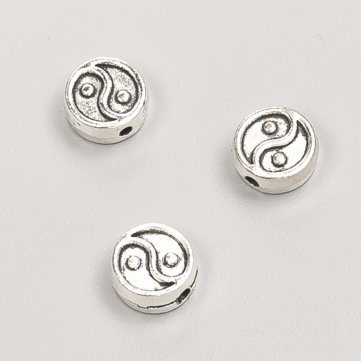 Kovová součástka – korálka-vložka Yin-Yang, průměr 8×4 mm, balení 20 g, 21 ks ± barva kovu „stříbro“