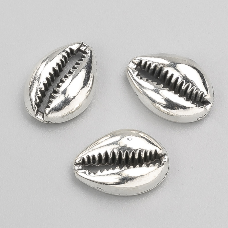 Přívěšek bez otvoru – mušle 17×12×5 mm balení 10 ks ± 20 g