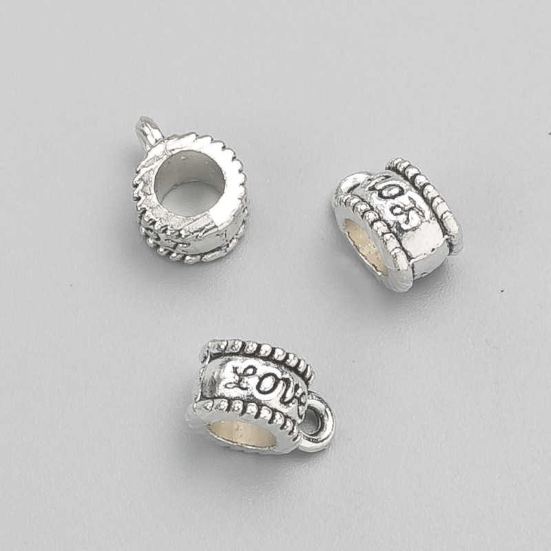 Poutko (bail) pro šperk «Love», rozměry 8×6×11 mm, díra 4,5 mm, balení 20 g ± 20 ks