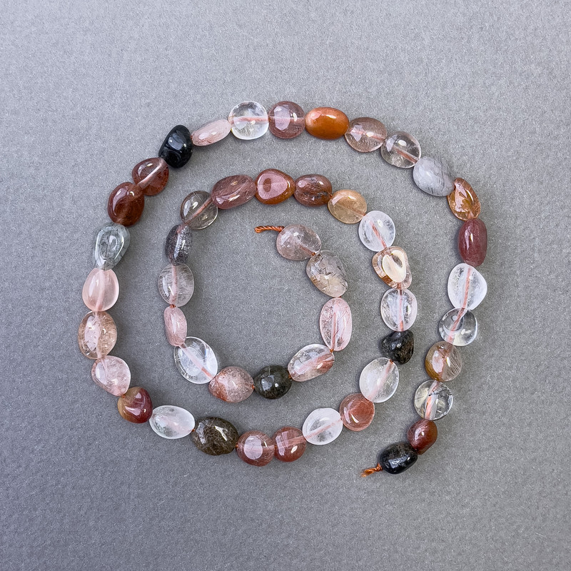 Korálky z rutilového křemene Vláskový, přírodní kámen, facetované, průměr cca 7×9 mm, délka 40 cm