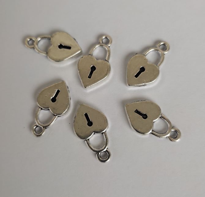 Kovové komponenty - srdcový zámek, průměr 10×18 mm, balení 20 g, 16 ks (+/-)